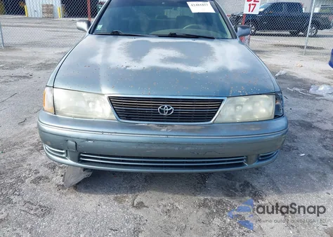1999 Toyota Avalon Xl from USA, damaged, VIN 4T1BF18B0XU328519